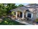Charming single-story home featuring an intricate rock garden and a covered entryway with columns at 814 Vercelli St, Deltona, FL 32725