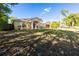 Charming single-story home featuring a manicured lawn, covered entryway, and a two-car garage at 814 Vercelli St, Deltona, FL 32725