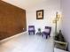 Cozy sitting room with plush purple chairs and modern decor at 814 Vercelli St, Deltona, FL 32725
