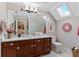 Bathroom features a skylight above the vanity, providing bright, natural light at 9624 Bryanston Dr, Orlando, FL 32827