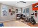 Well-lit flex room with sports décor, ideal for a home gym or office at 9624 Bryanston Dr, Orlando, FL 32827