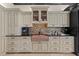 Well-appointed kitchen showcases a farmhouse sink, custom cabinets, and modern appliances at 9624 Bryanston Dr, Orlando, FL 32827