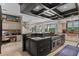 Gourmet kitchen with a large island, granite countertops, stainless steel appliances, and custom cabinetry at 9624 Bryanston Dr, Orlando, FL 32827