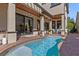 Backyard pool with brick patio area, perfect for relaxing and entertaining guests outdoors at 9624 Bryanston Dr, Orlando, FL 32827