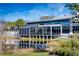 Canella's features waterfront views, modern design, and dining area where residents can enjoy a meal at 9624 Bryanston Dr, Orlando, FL 32827