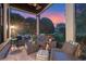 Comfortable screened-in porch with sectional seating and outdoor furniture at 9624 Bryanston Dr, Orlando, FL 32827