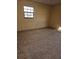 Bedroom featuring a window providing natural light at 9741 Se Highway 464C Se Hwy, Ocklawaha, FL 32179