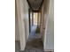 Hallway leading to various rooms at 9741 Se Highway 464C Se Hwy, Ocklawaha, FL 32179
