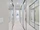 This hallway offers access to every room in the house, as well as a closet with mirrored doors at 11763 Eagle Ray Ln, Orlando, FL 32827