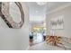 Bright and airy living space with an open floor plan and views of the pool area through sliding glass doors at 11763 Eagle Ray Ln, Orlando, FL 32827
