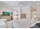 The main bedroom offers neutral tones, ensuite bath, and access to the rest of the home at 11763 Eagle Ray Ln, Orlando, FL 32827