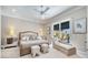 Bright main bedroom features sliding glass doors that lead to a lanai with plenty of room for relaxing at 11763 Eagle Ray Ln, Orlando, FL 32827