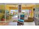 Lanai with summer kitchen, dining and seating areas, and views of pool at 11763 Eagle Ray Ln, Orlando, FL 32827