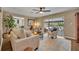 Inviting living room with comfortable seating and view of the backyard pool at 1304 Deer Run Dr, Winter Springs, FL 32708