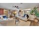 Cozy living room with stylish decor, comfortable seating, and lots of light at 1304 Deer Run Dr, Winter Springs, FL 32708