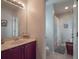 Well-lit bathroom featuring a single sink vanity with a walk-in shower at 14242 Avenue Of The Groves, Winter Garden, FL 34787