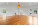 Bright living room boasts hardwood floors, high ceilings, recessed lighting, and French doors to the outside at 1702 N Westmoreland Dr, Orlando, FL 32804