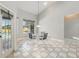 Breakfast nook near pool with lots of natural light and view of large yard at 1851 Sweetwater West Cir, Apopka, FL 32712