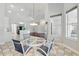 Living and dining area with kitchen featuring an open floorplan at 1851 Sweetwater West Cir, Apopka, FL 32712