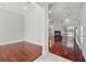 Spacious living room boasts gleaming wood floors, fireplace, and sliding glass doors to pool at 1851 Sweetwater West Cir, Apopka, FL 32712