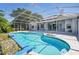 An inviting pool with a large patio deck and outdoor view at 1851 Sweetwater West Cir, Apopka, FL 32712