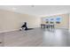 Spacious bonus room with light gray floors and bright natural light is perfect for entertainment at 19334 Banfield Pl, Orlando, FL 32827