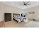 Spacious main bedroom features a ceiling fan, modern decor, and ample natural light at 19334 Banfield Pl, Orlando, FL 32827
