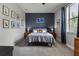 Inviting bedroom showcases stylish decor, soft lighting, and a cozy bed with decorative pillows at 1945 Via Lago Dr, Lakeland, FL 33810