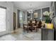 Charming dining room featuring a modern chandelier, and decor creating a cozy ambiance at 1945 Via Lago Dr, Lakeland, FL 33810