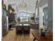 Bright, open kitchen with stainless steel appliances, center island, and a large window at 1945 Via Lago Dr, Lakeland, FL 33810