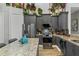 Well-equipped kitchen with granite countertops, stainless steel appliances, and ample cabinet space at 1945 Via Lago Dr, Lakeland, FL 33810