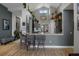Modern kitchen featuring a breakfast bar, pendant lighting, and open access to the dining and living areas at 1945 Via Lago Dr, Lakeland, FL 33810