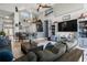 Open-concept living room with a seamless flow to the kitchen and a view of modern decor at 1945 Via Lago Dr, Lakeland, FL 33810
