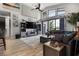 Spacious living room with high ceilings, comfortable seating, and abundant natural light at 1945 Via Lago Dr, Lakeland, FL 33810