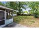 Backyard featuring greenery and shed at 226 S Apollo Dr, Apopka, FL 32703