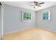 Bright bedroom featuring hardwood floors, neutral walls and natural lighting at 226 S Apollo Dr, Apopka, FL 32703
