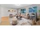 Inviting living room with neutral tones, stylish furniture, and ample natural light at 226 S Apollo Dr, Apopka, FL 32703