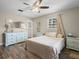 Inviting bedroom with ceiling fan, light-colored walls, and tile flooring at 228 Deleon Rd, Debary, FL 32713