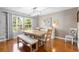 Dining room featuring natural light, a modern chandelier, and neutral decor at 228 Deleon Rd, Debary, FL 32713