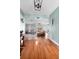 Open-concept living room with hardwood floors and bright natural light at 228 Deleon Rd, Debary, FL 32713