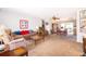 Inviting living room featuring plush carpeting, neutral walls, and comfortable seating at 2411 Trafalgar Dr, Orlando, FL 32837
