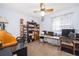 Functional home office space with a desk, multiple monitors, and ample storage at 2411 Trafalgar Dr, Orlando, FL 32837
