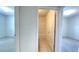 Bathroom entryway with tile floors leads to a bathtub and shower combination at 271 Tanglewood Dr, Davenport, FL 33896