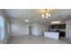 Bright and airy living space showcasing the kitchen and living room at 271 Tanglewood Dr, Davenport, FL 33896