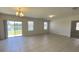 Living room features a view of the lake through the sliding glass door at 271 Tanglewood Dr, Davenport, FL 33896
