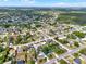 Wide aerial view of a residential neighborhood highlighting the close proximity of homes and community layout at 2764 W Covington Dr, Deltona, FL 32738