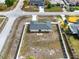 Overhead view of a home with a large, fenced backyard, highlighting its prime location at 2764 W Covington Dr, Deltona, FL 32738