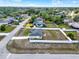 Property aerial shot, showing the layout and surrounding greenery in a peaceful residential area at 2764 W Covington Dr, Deltona, FL 32738