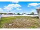 Large backyard with a white fence and plenty of space for outdoor activities at 2764 W Covington Dr, Deltona, FL 32738