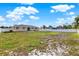 Expansive backyard with a white fence, offering plenty of space for outdoor activities and gardening at 2764 W Covington Dr, Deltona, FL 32738